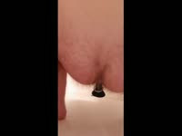 Holding shitty butt plug in mouth